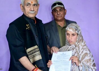 LG meets the family of martyr Syed Adil Hussain at Anantnag, hands over appointment letter to his wife on compassionate ground