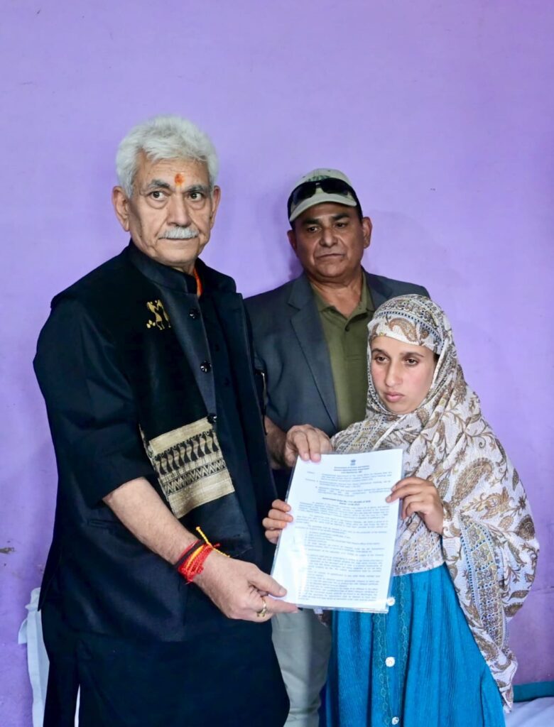 LG meets the family of martyr Syed Adil Hussain at Anantnag, hands over appointment letter to his wife on compassionate ground 1 1000411215